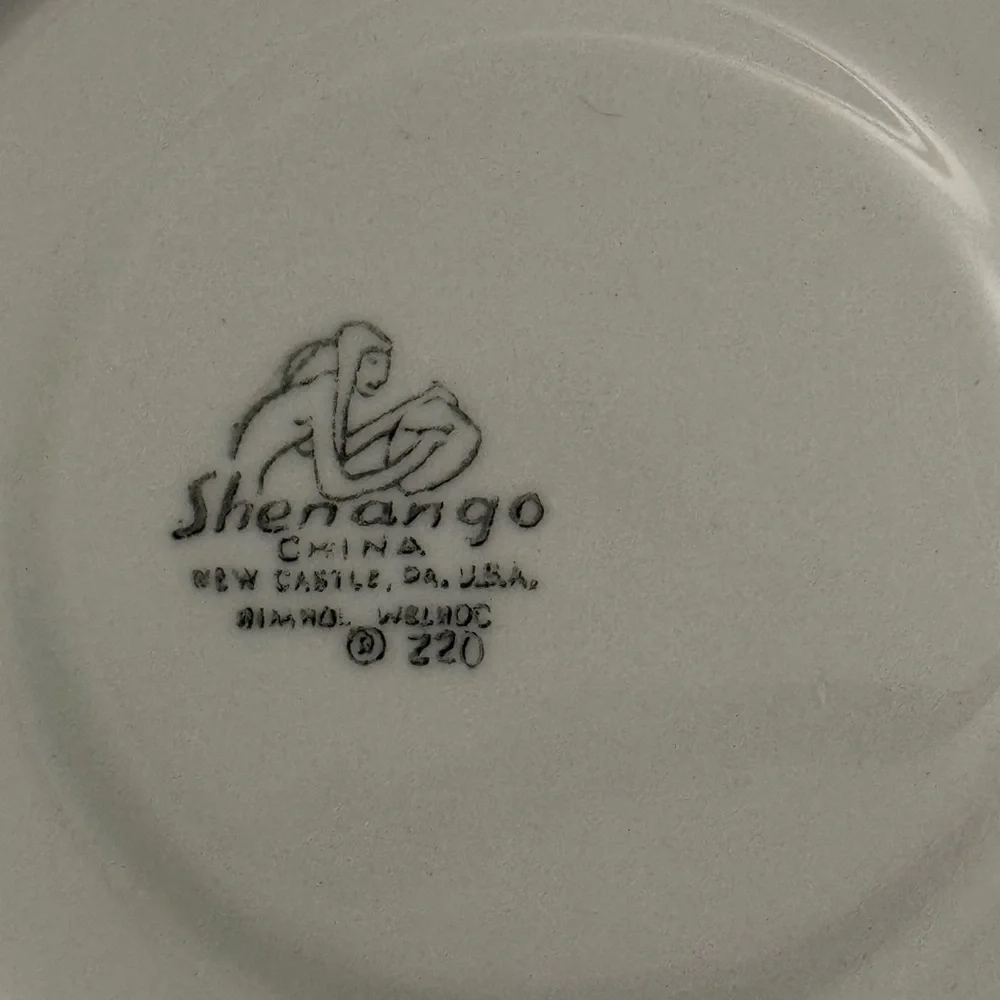 Cream and Blue Dinnerware Plate with Intricate Design
